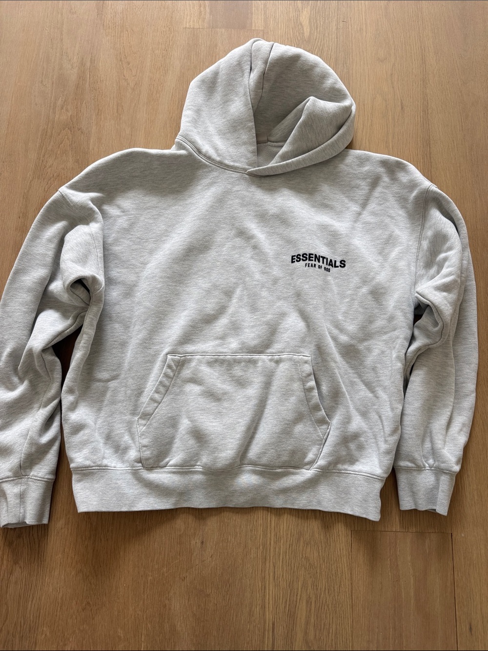 ESSENTIALS Light Gray Hoodie with Minimal Chest Logo